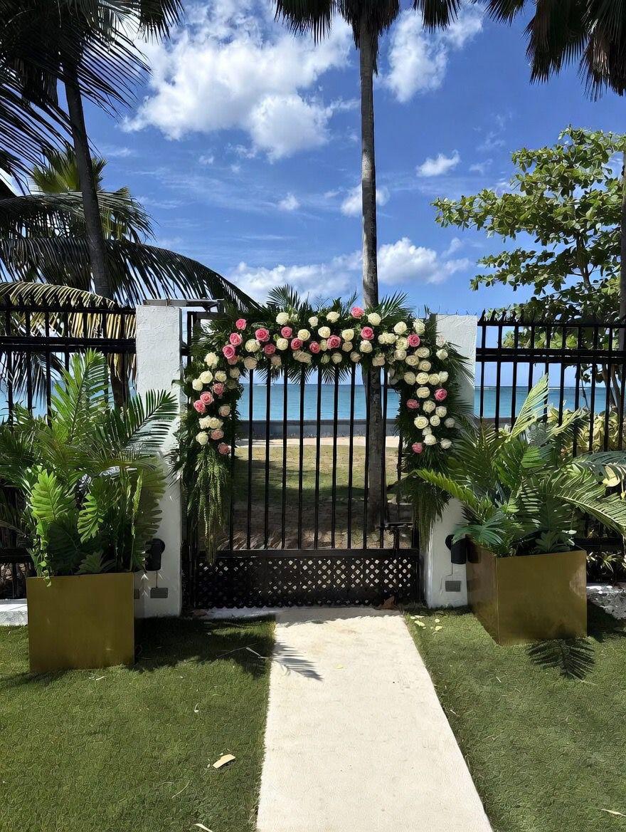 Beachfront wedding ceremony arch at Grace Collection